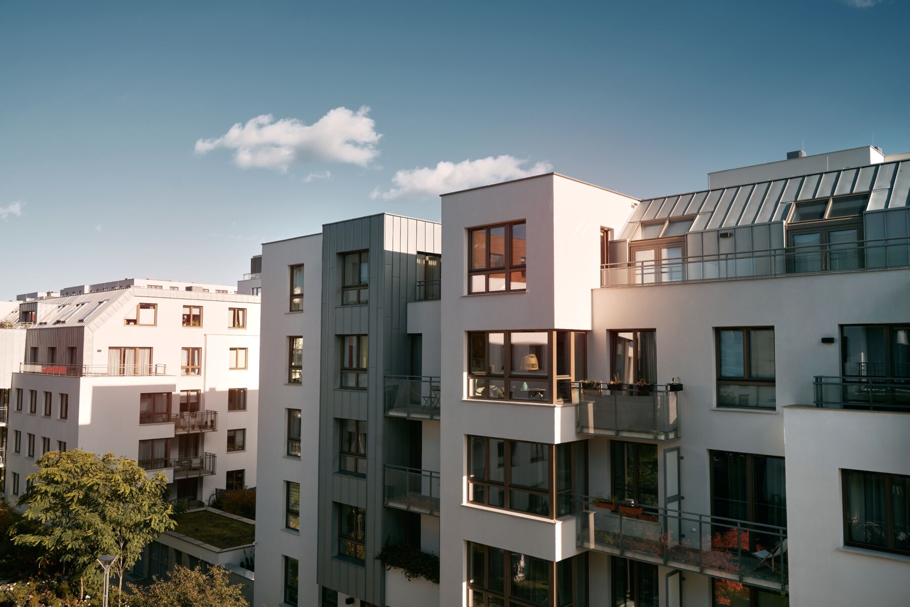 An exterior view of luxury apartments.