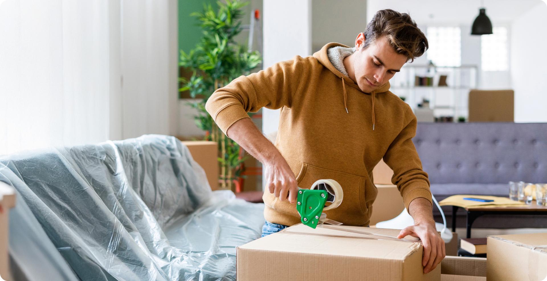 Man packing boxes