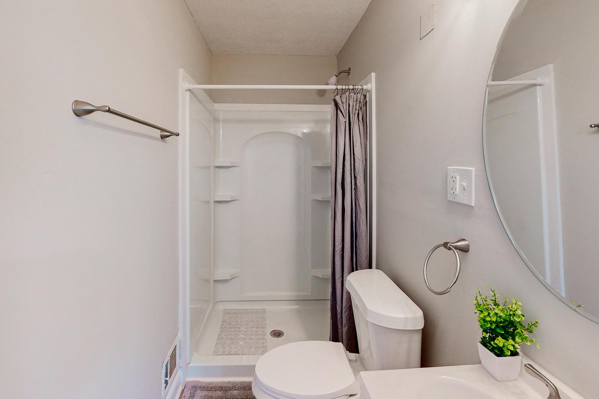 En-suite with walk -in shower.