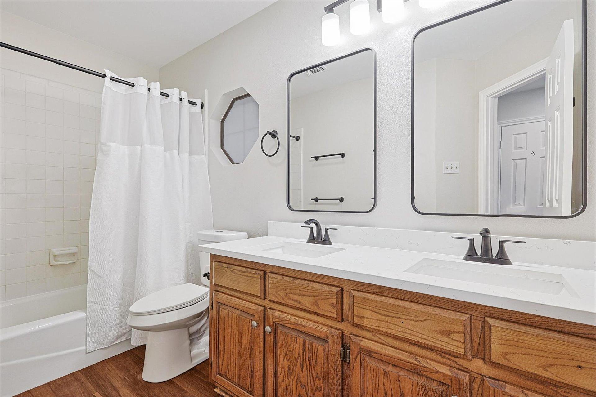 shared hall bath with double sink