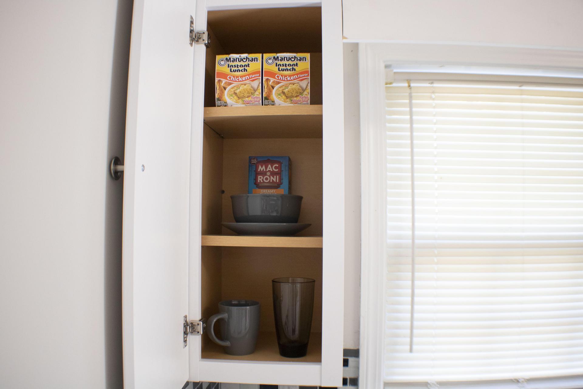 Labeled cabinets with supplies