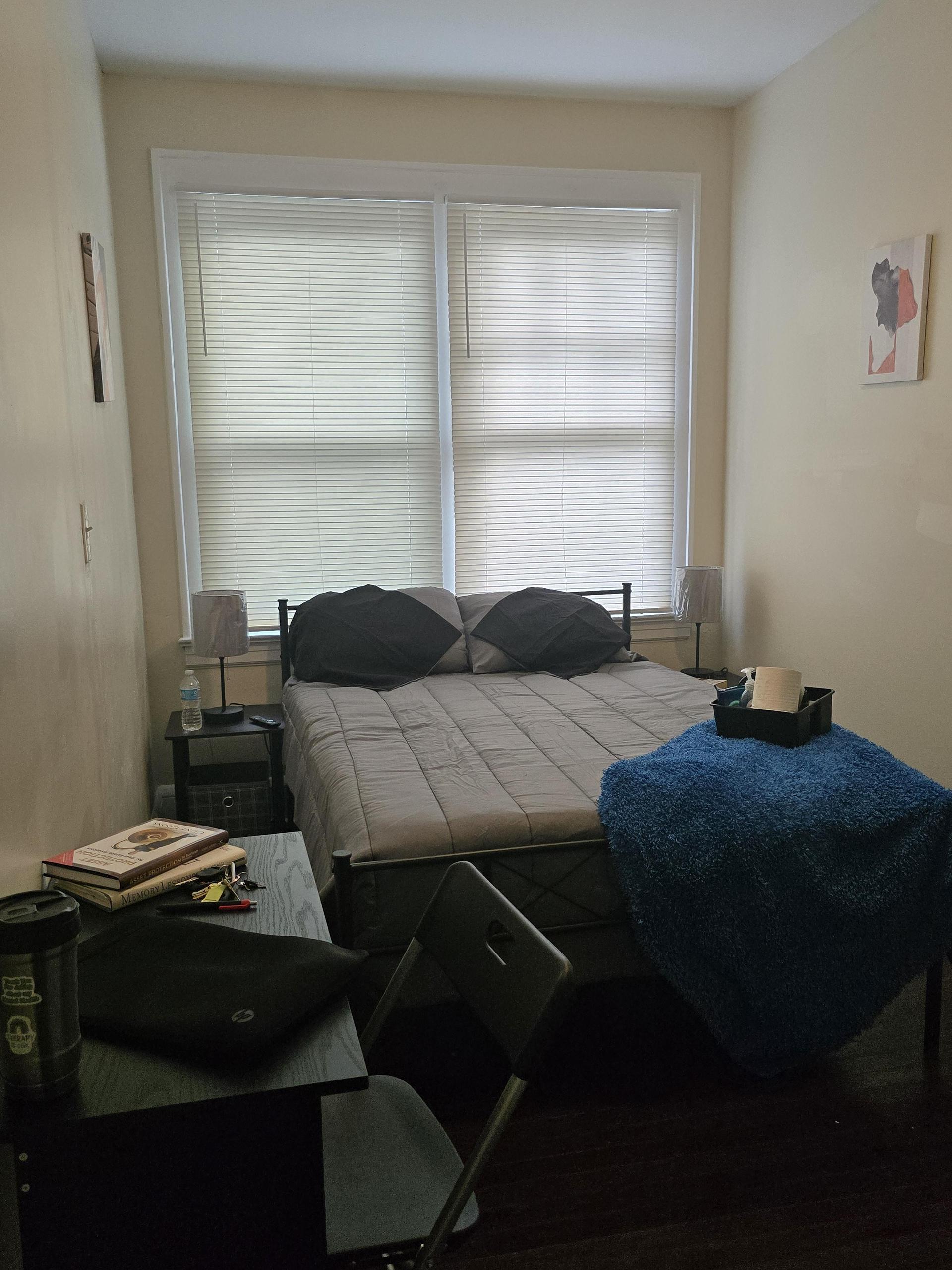 Room 6 comes with full bed, linens, TV, mini fridge, desk, chair, nightstand, clothing rack