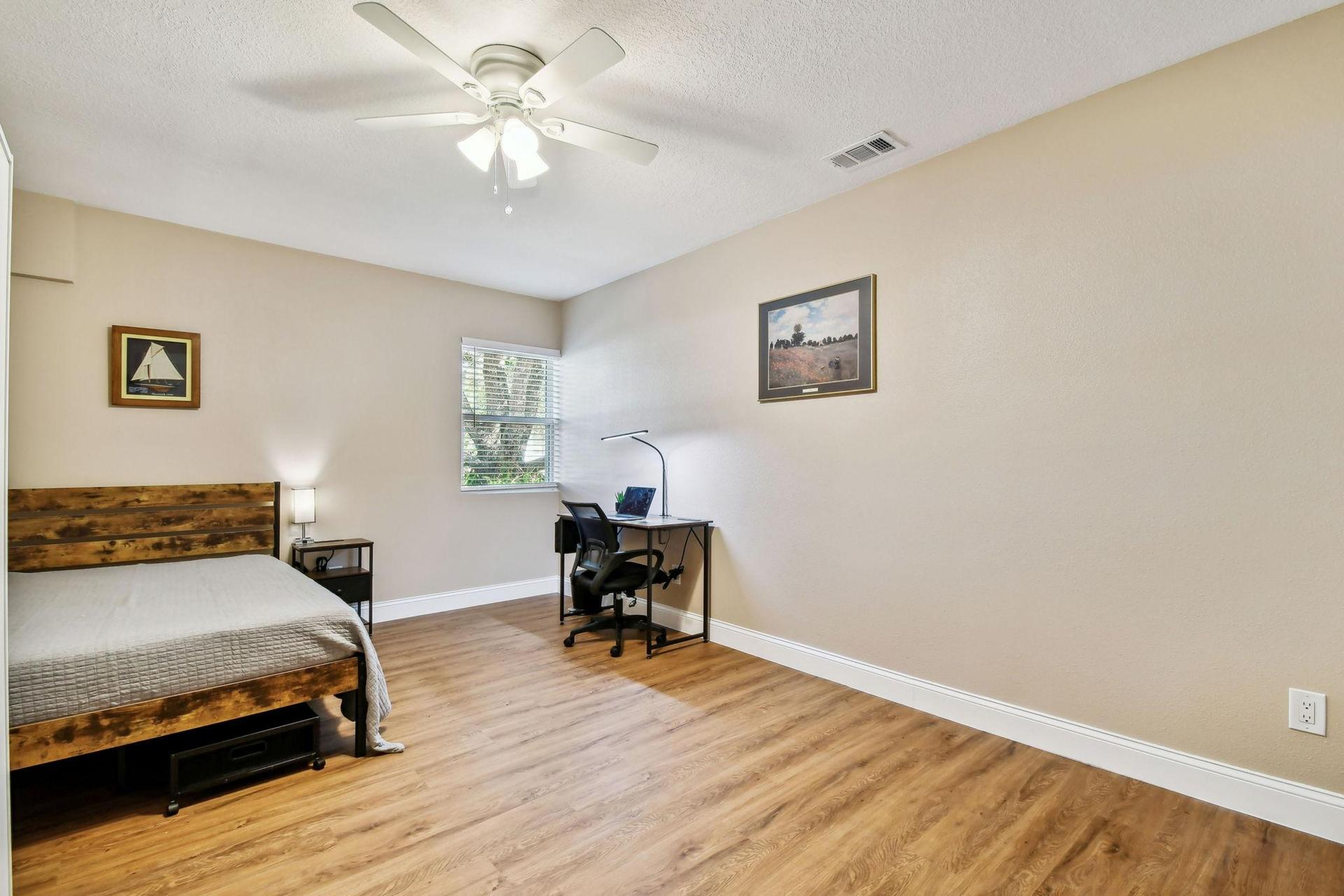 Desk, office chair and light