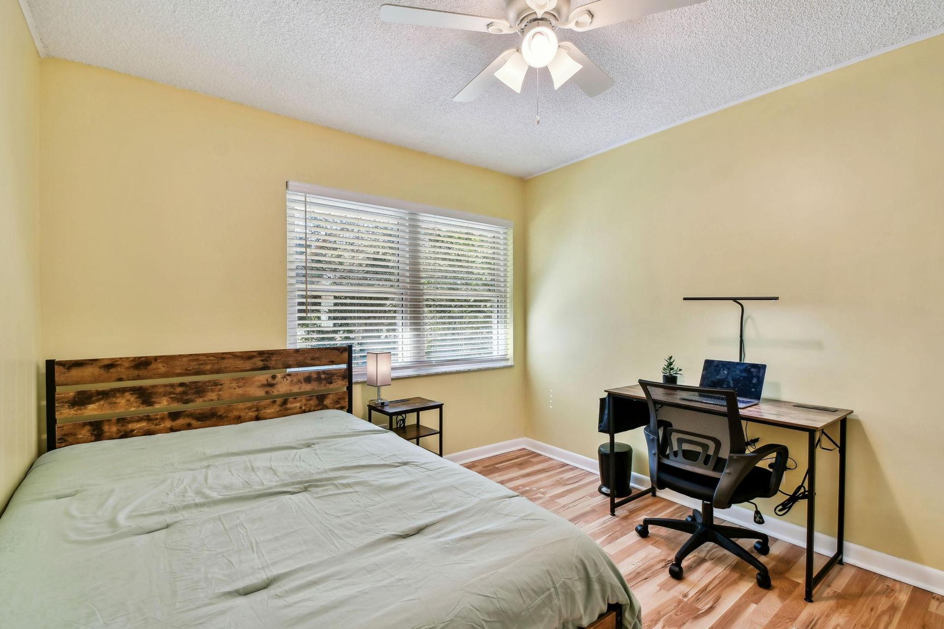 Desk, office chair and light