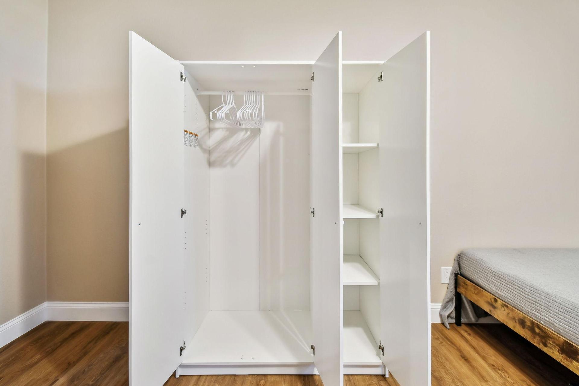 Armoire for hanging clothes and storage