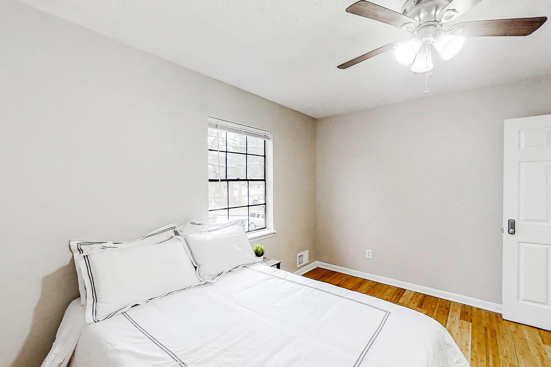 bedroom, detected: ceiling fan, bed, window blind