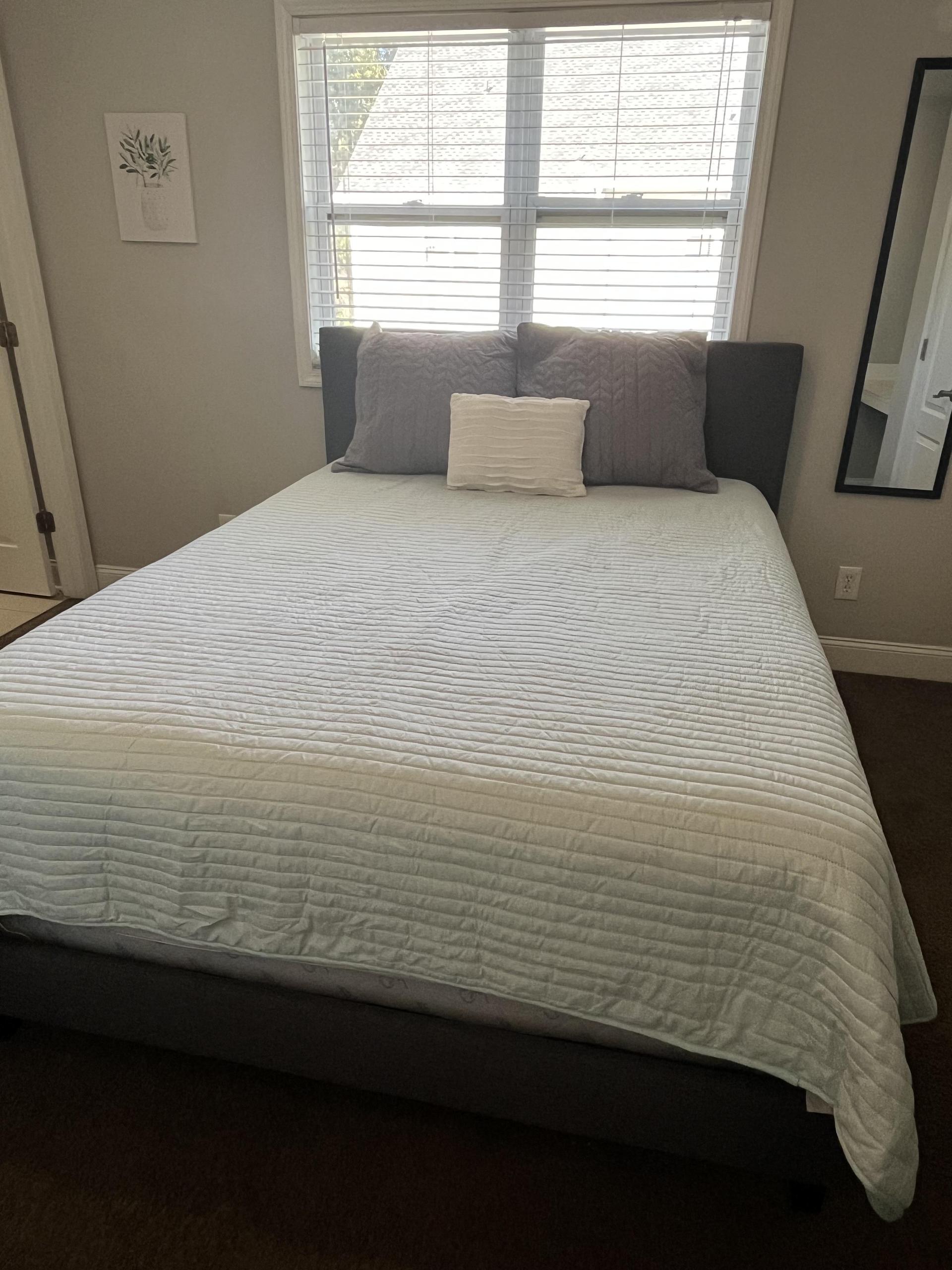 Queen bed with built-in desk for your convenience. Street parking only. **Bedding and TV NOT included.**