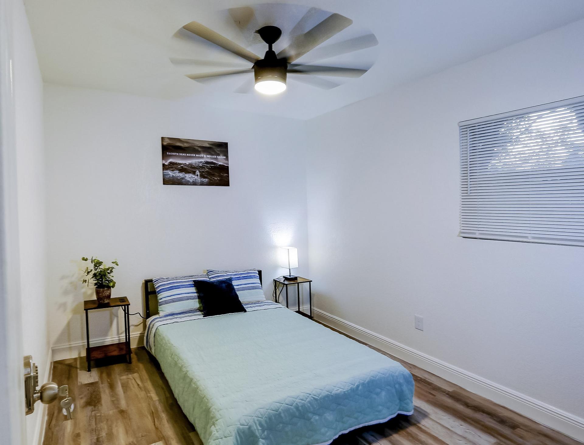 bedroom, detected:ceiling fan, window blind, bed