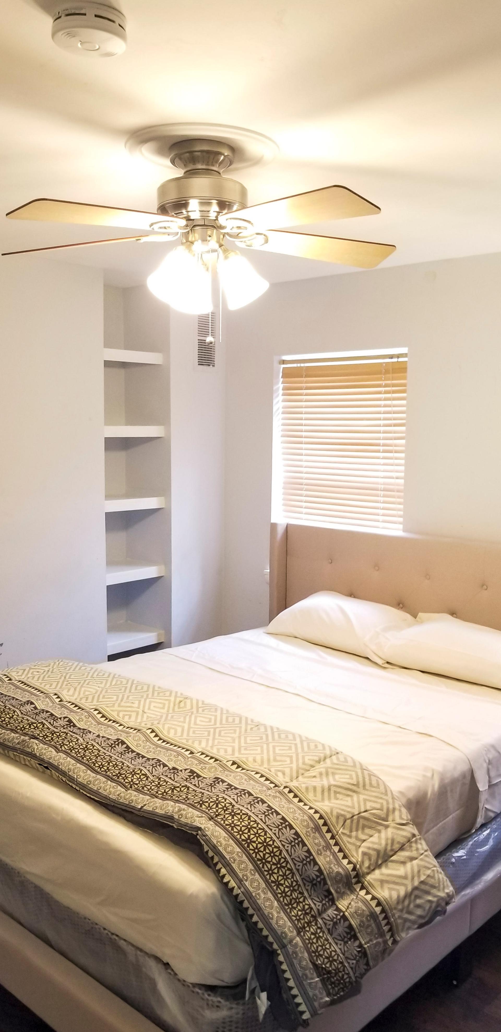 bedroom, detected:ceiling fan, window blind, bed