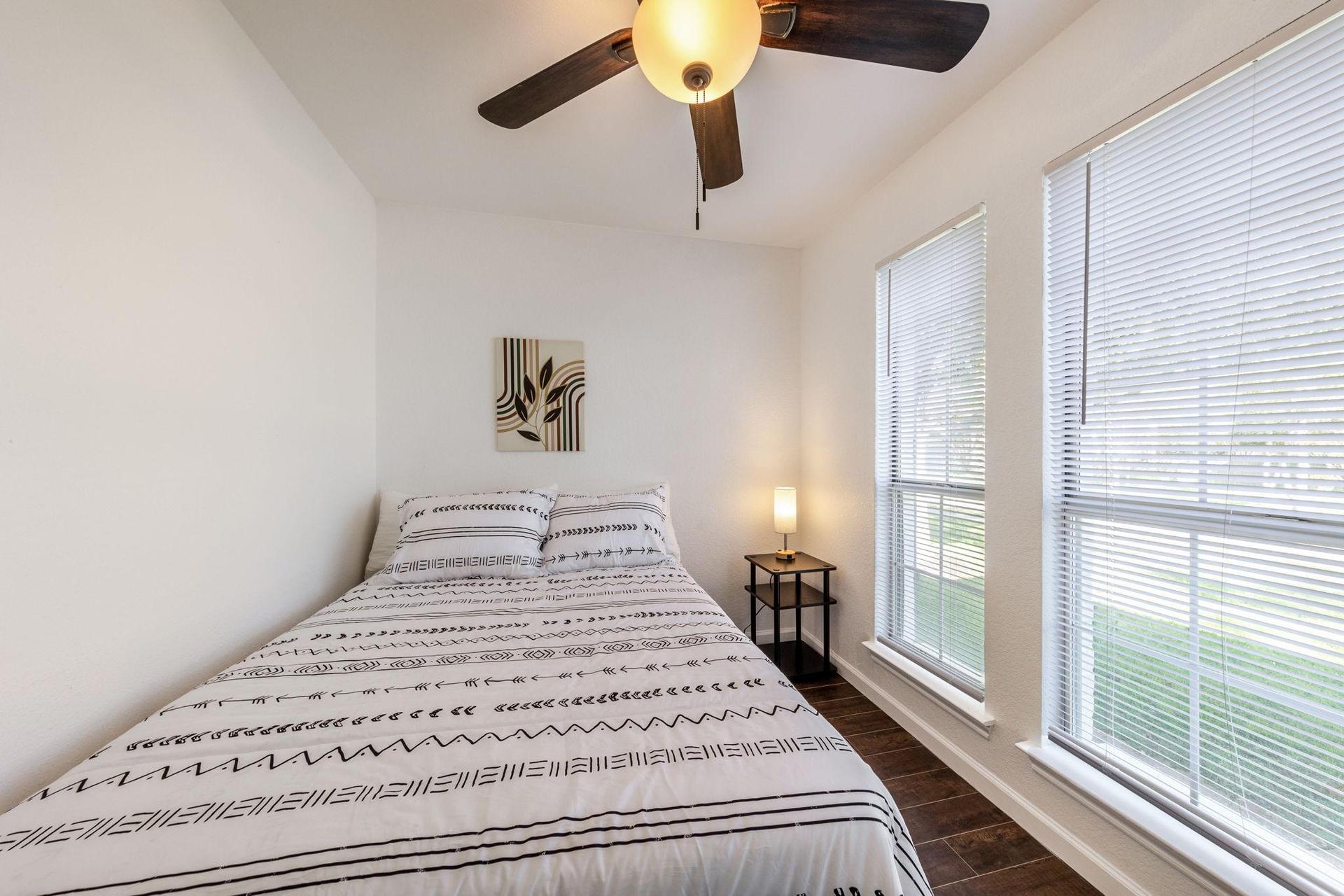 Cozy 1st floor bedroom with ceiling fan