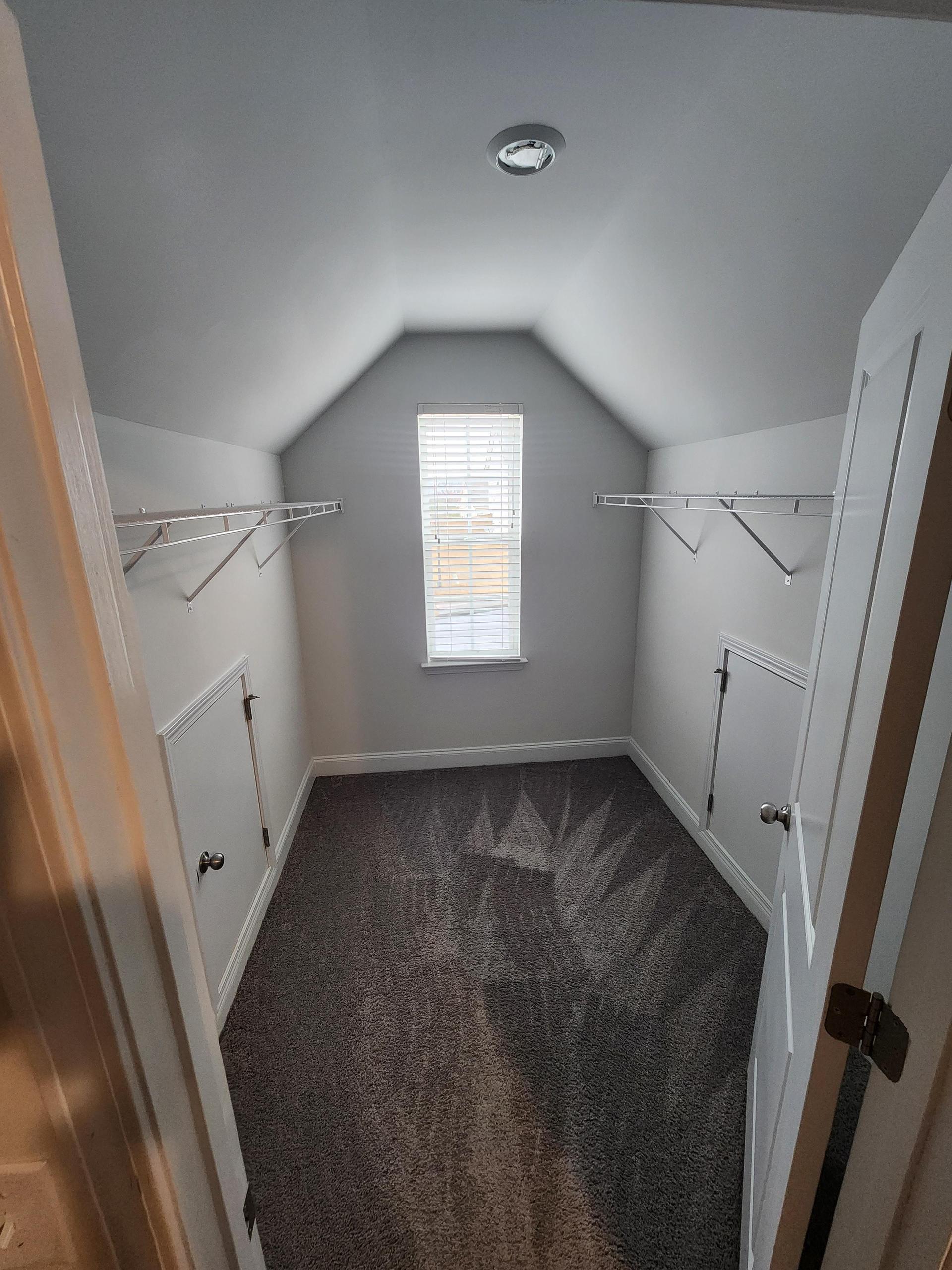 HUGE walk in closet with EXTRA storage and window in the closet!