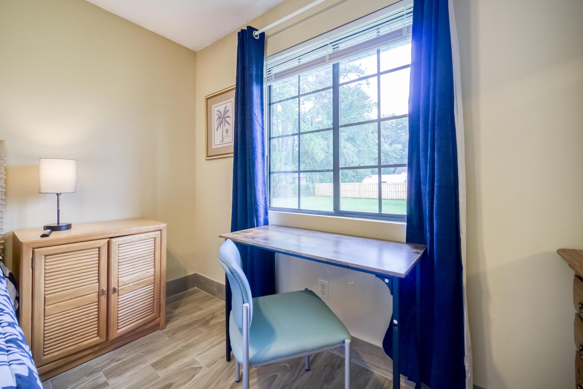 Nice Desk with Double window with Side Lot view