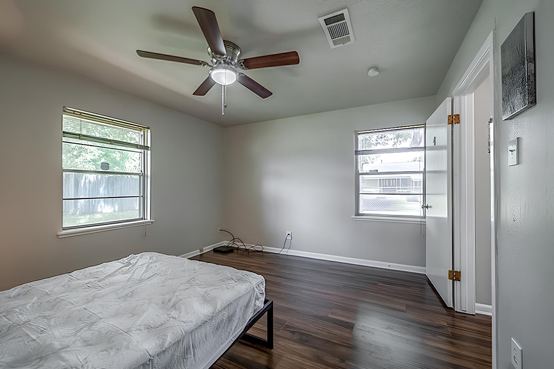 bedroom, detected: ceiling fan, hardwood, window blind