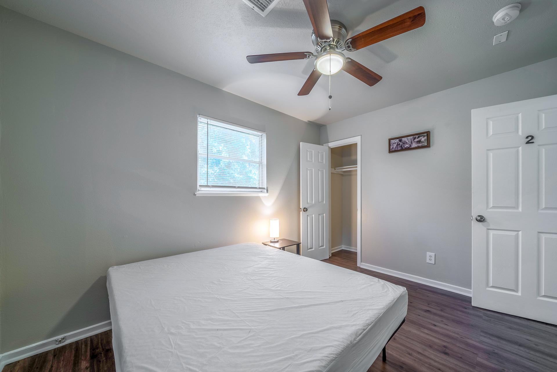 bedroom, detected: ceiling fan, window blind, bed