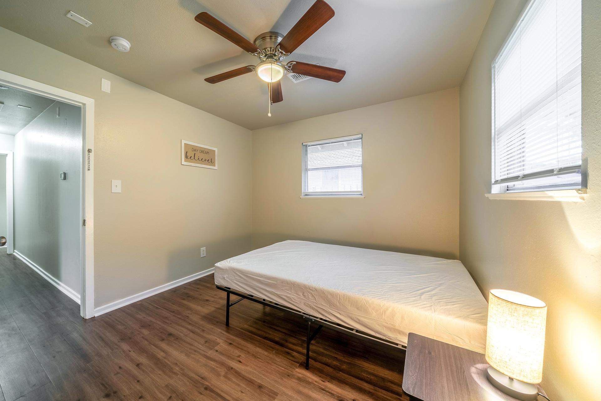 bedroom, detected: ceiling fan, window blind, bed