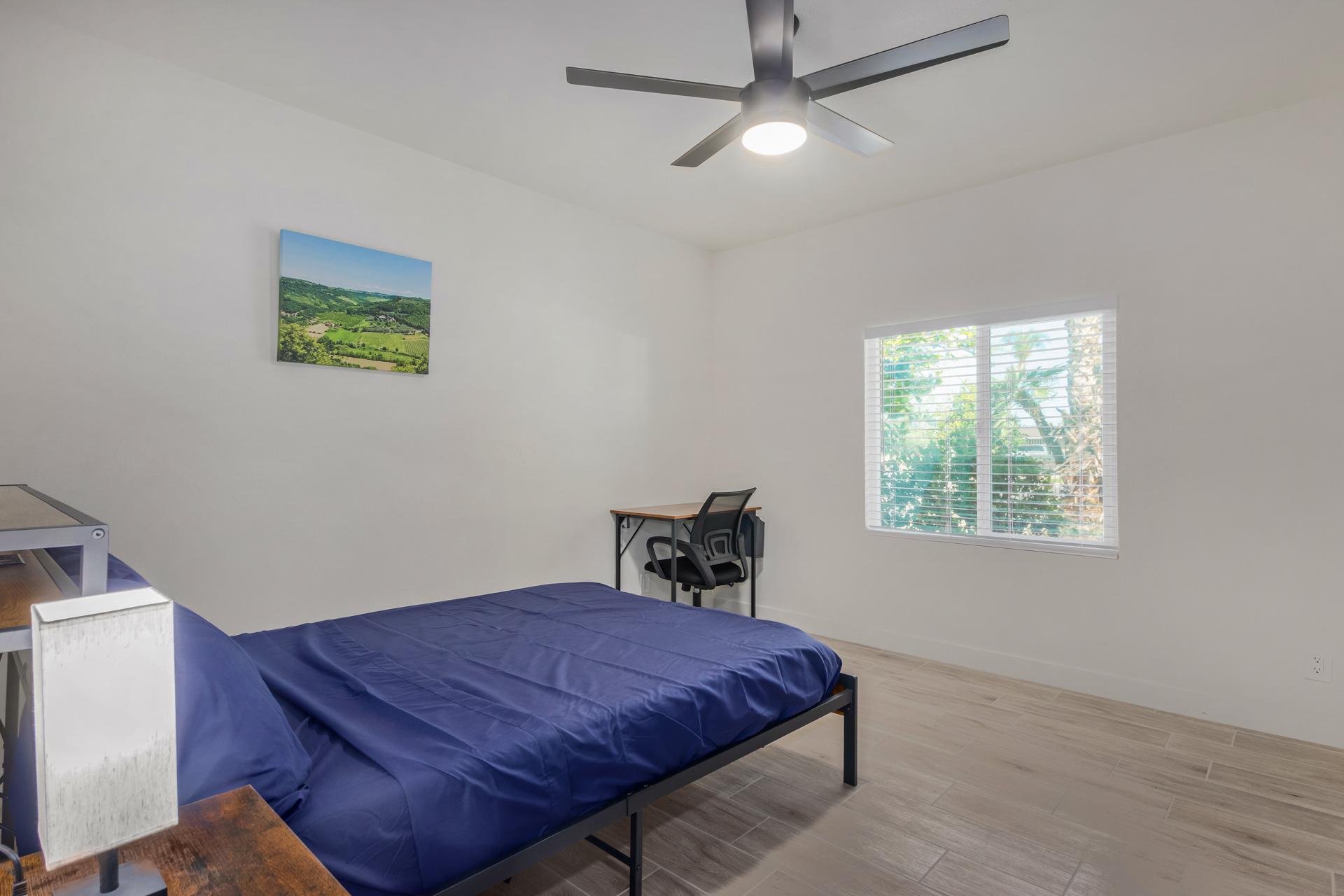 Spacious and clean room with huge window overlooking the trees.