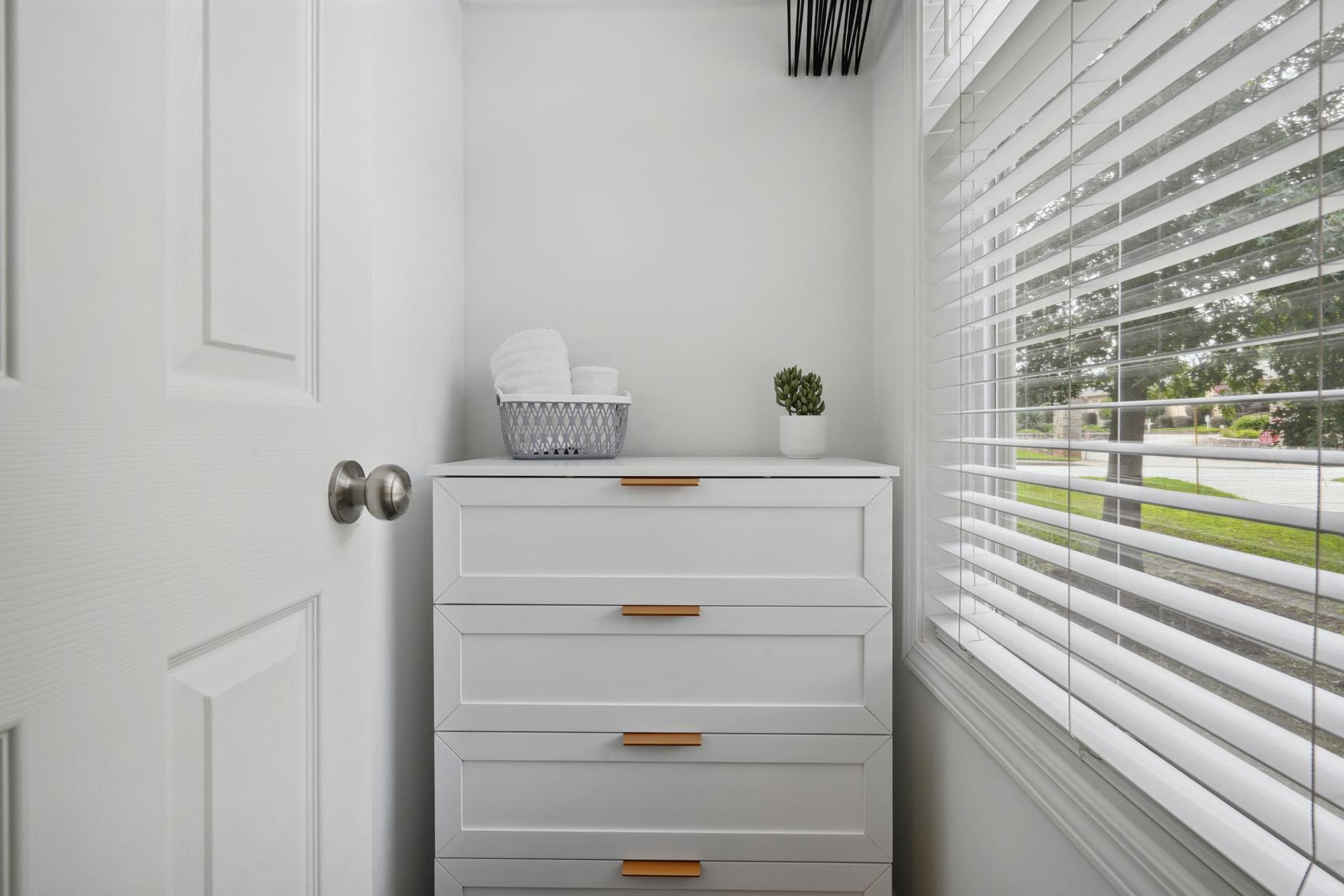 View of Closet with Dresser