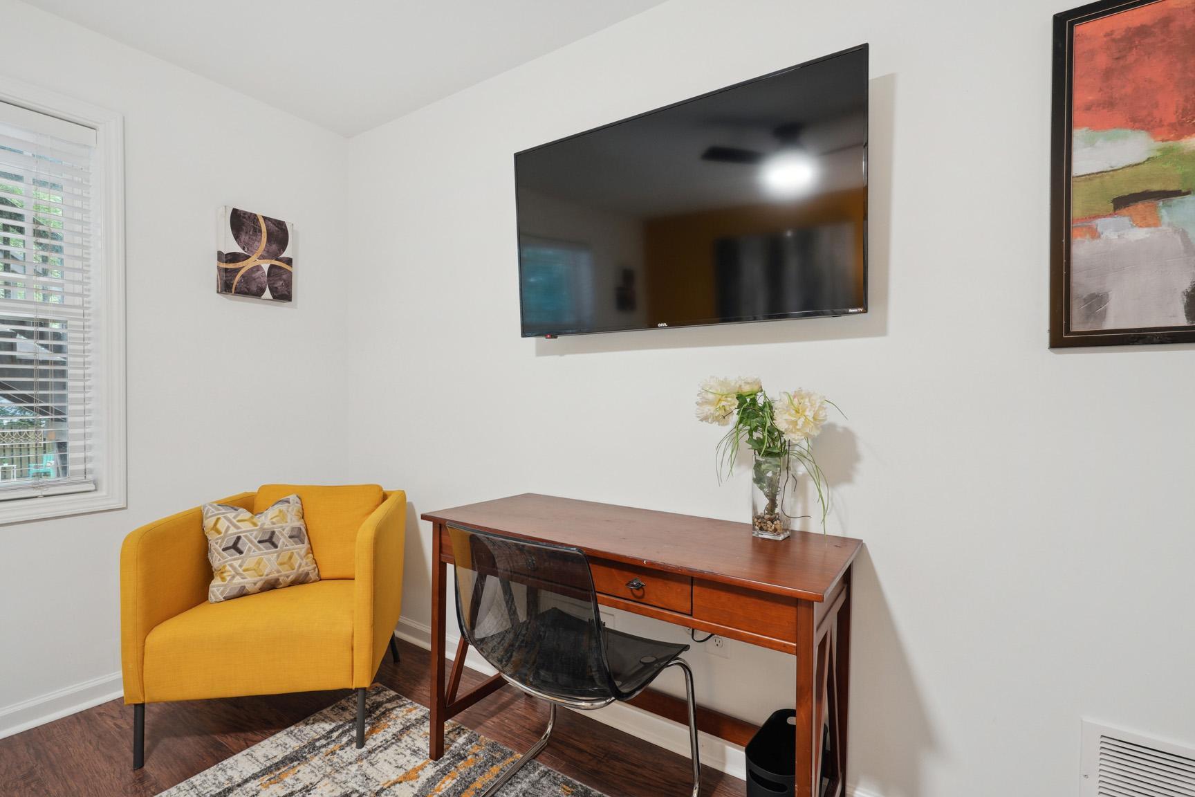 View of the Large TV and Desk Area