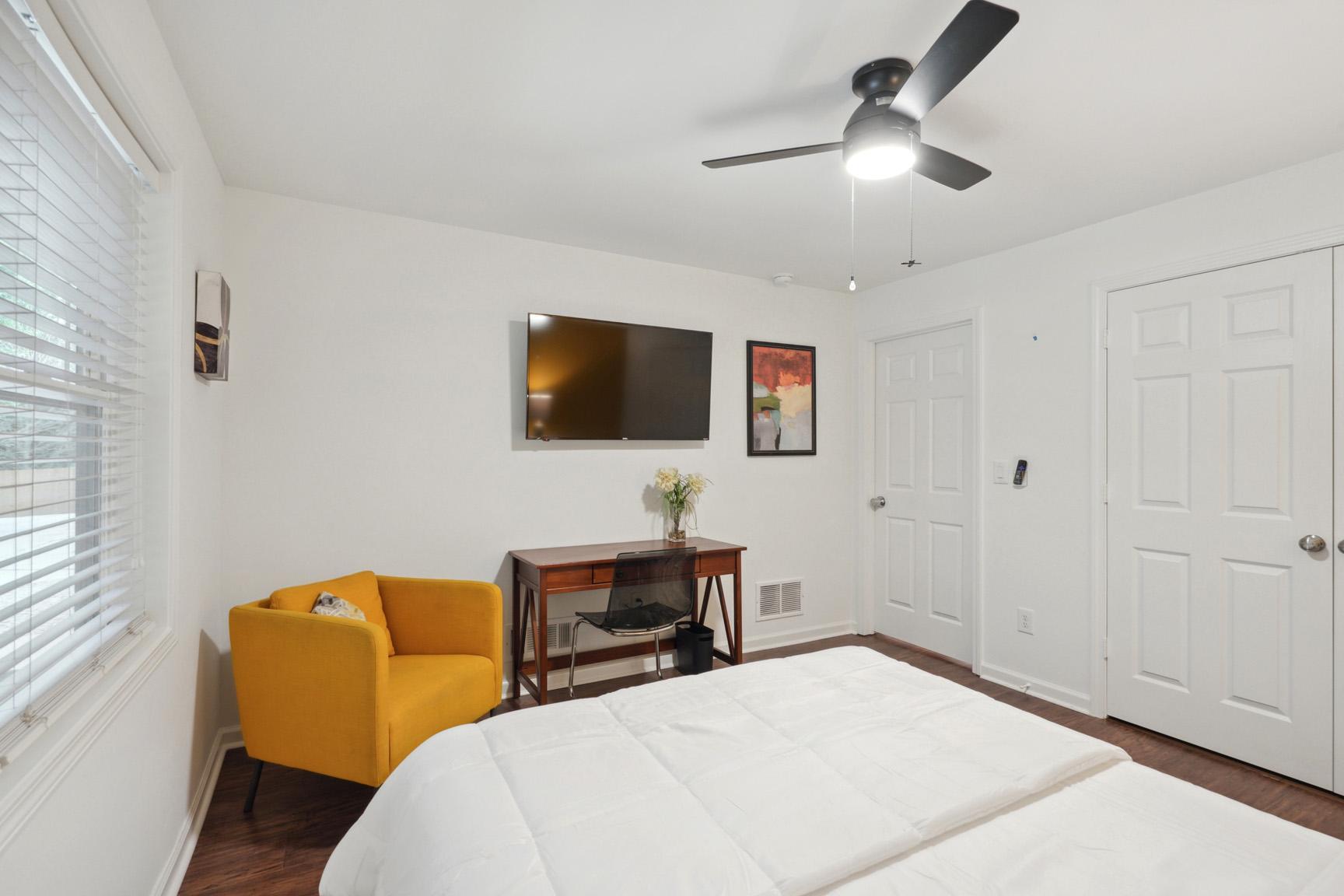 Another View of the Bedroom Looking into TV and Desk Area