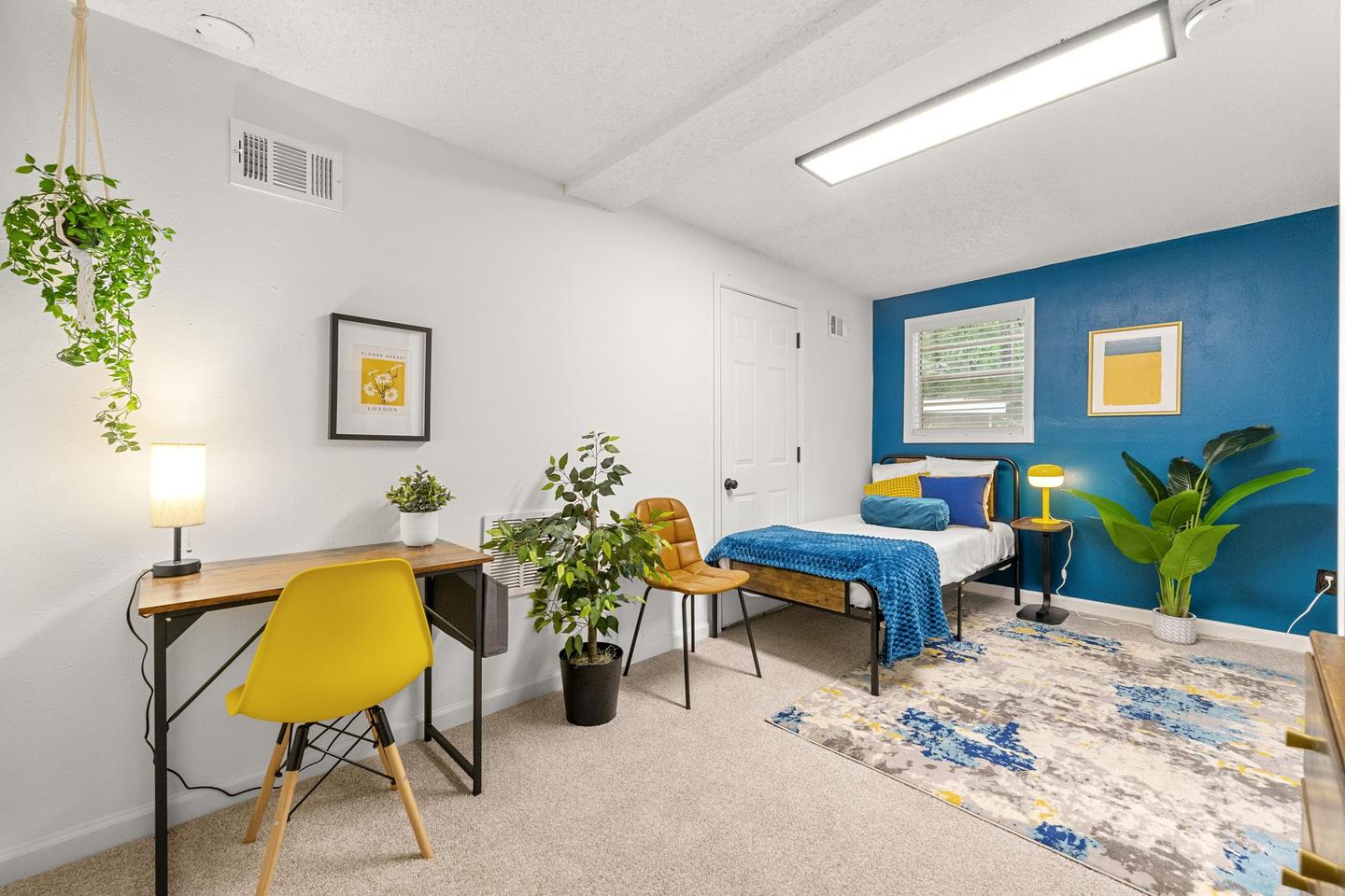 Cool basement room with desk & chest of drawers