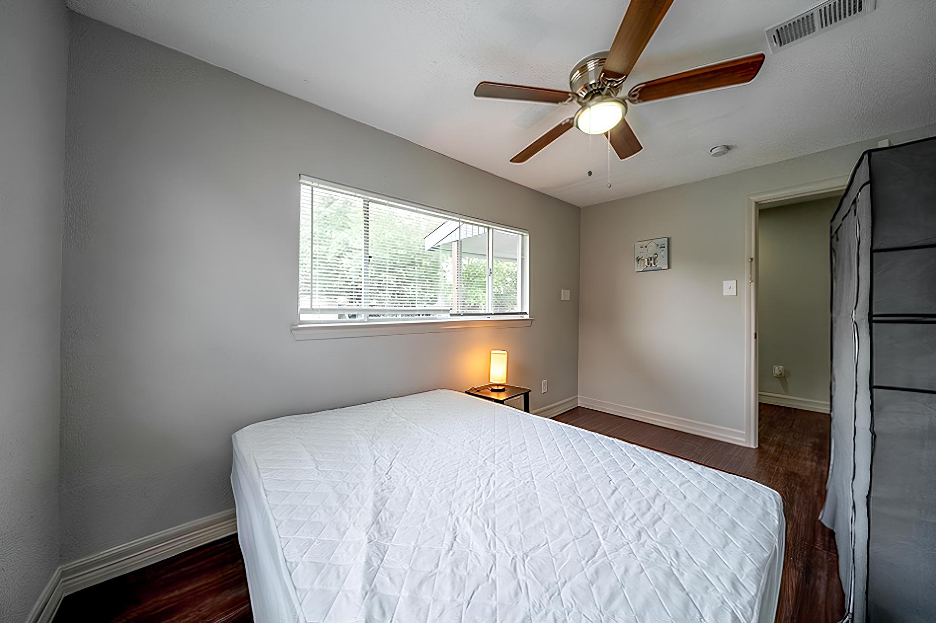 bedroom, detected: ceiling fan, window blind, bed