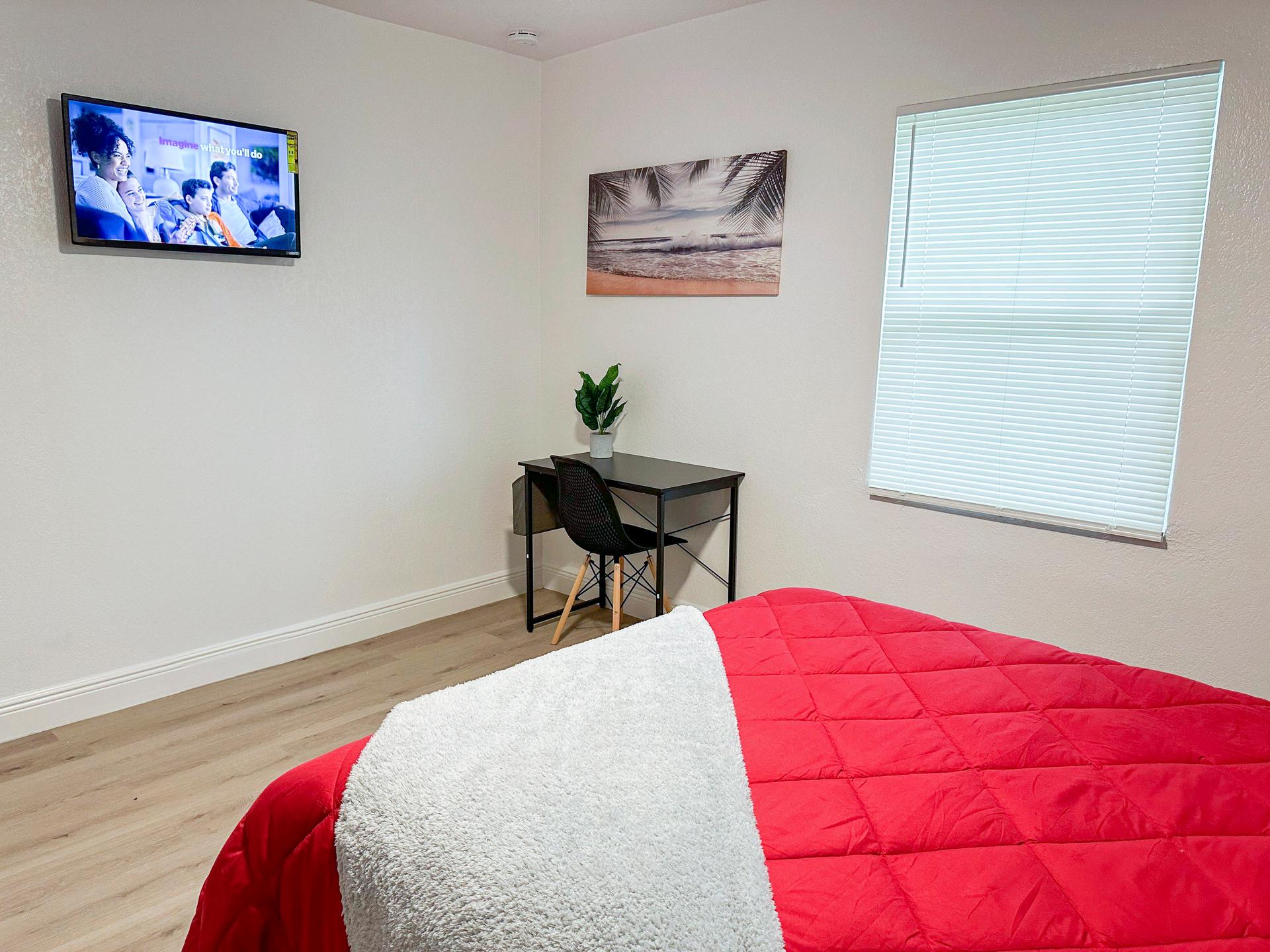 bedroom, detected:window blind, bed, carpet