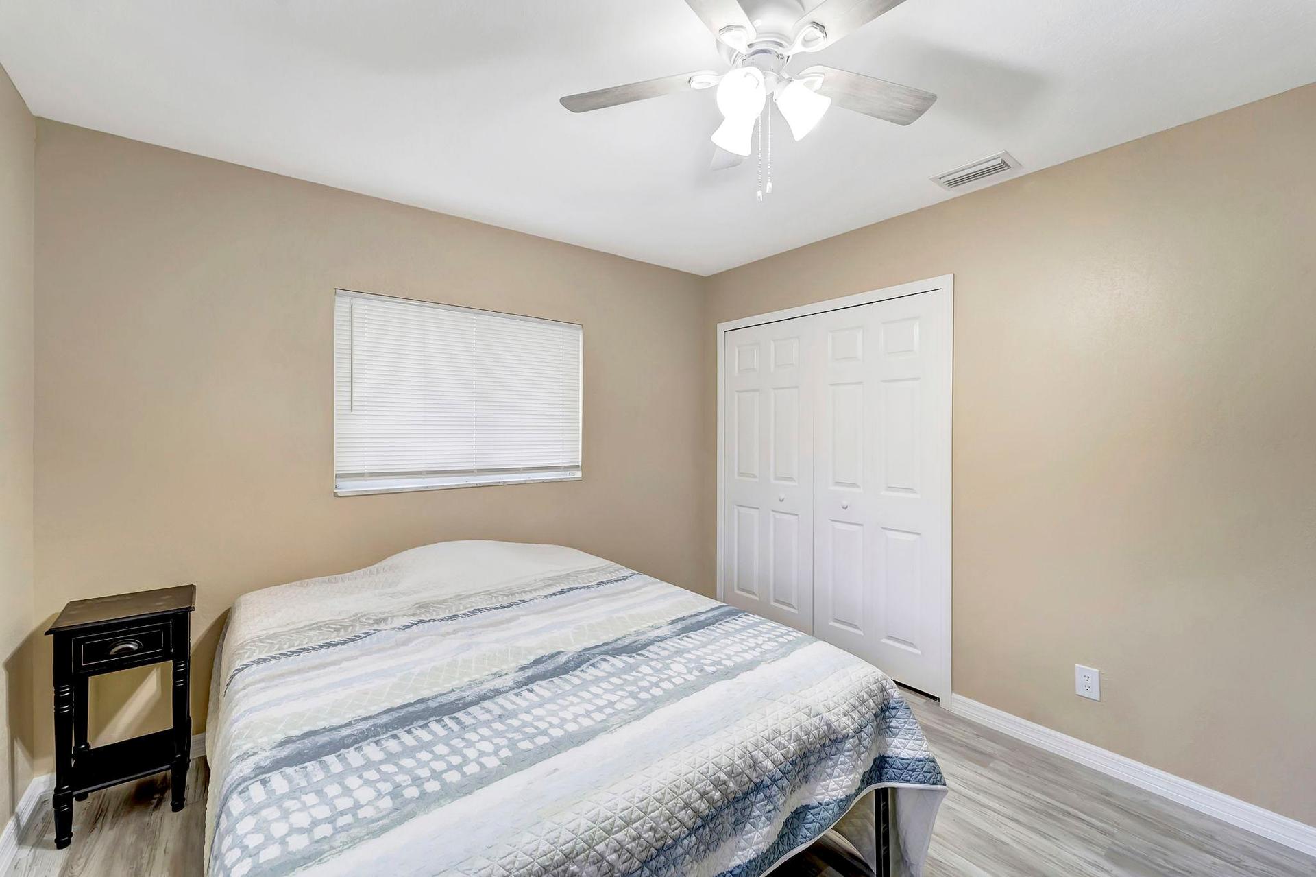 bedroom, detected:ceiling fan, bed, window blind