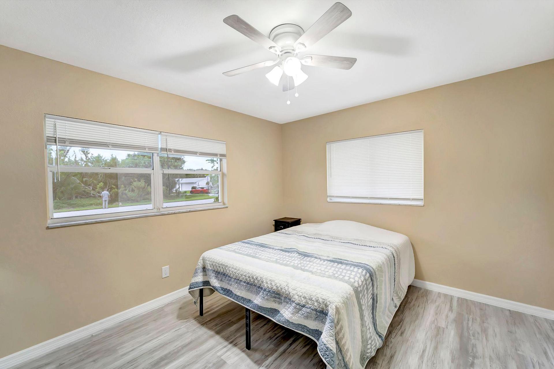 bedroom, detected:ceiling fan, window blind, bed