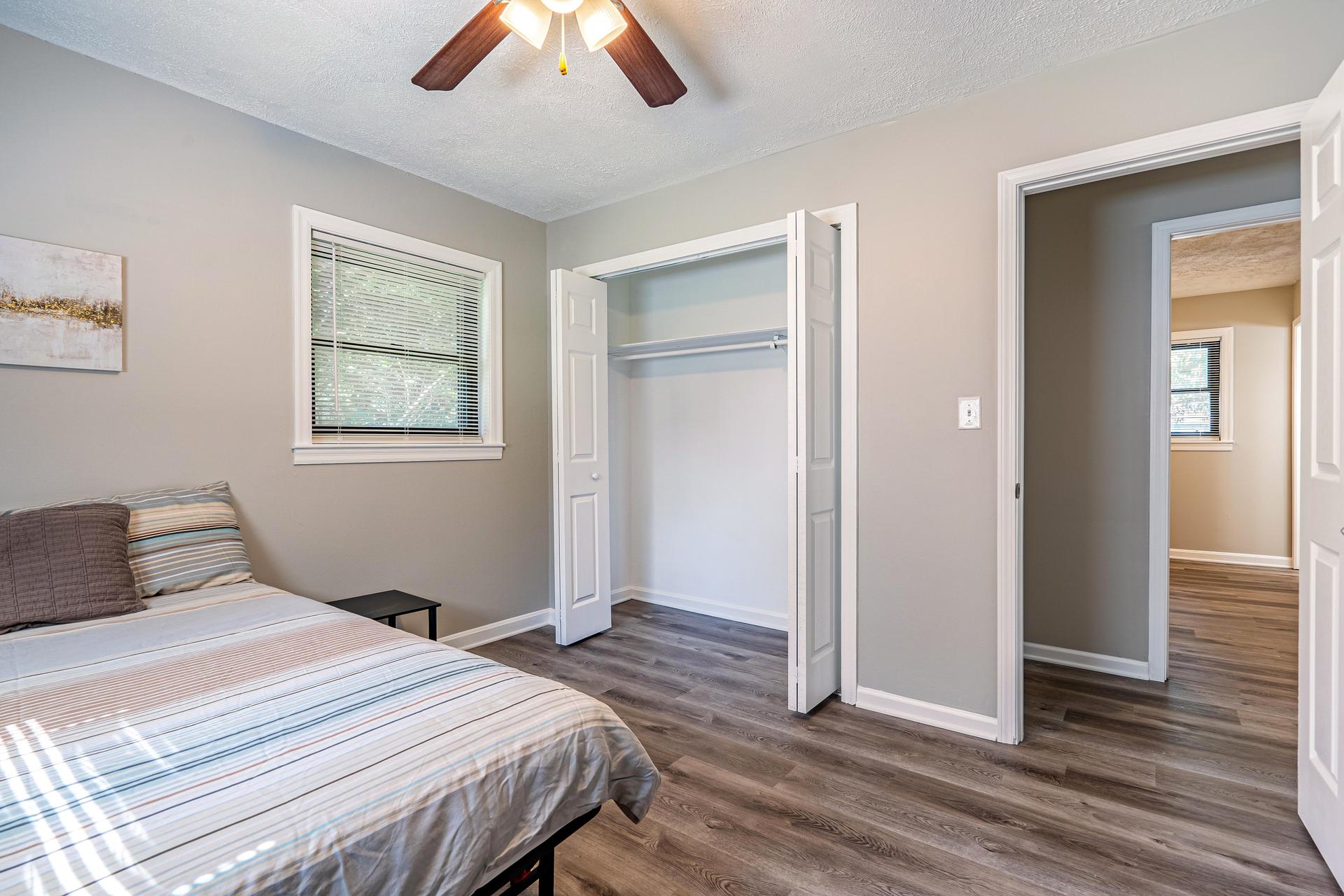 bedroom, detected: ceiling fan, window blind, bed