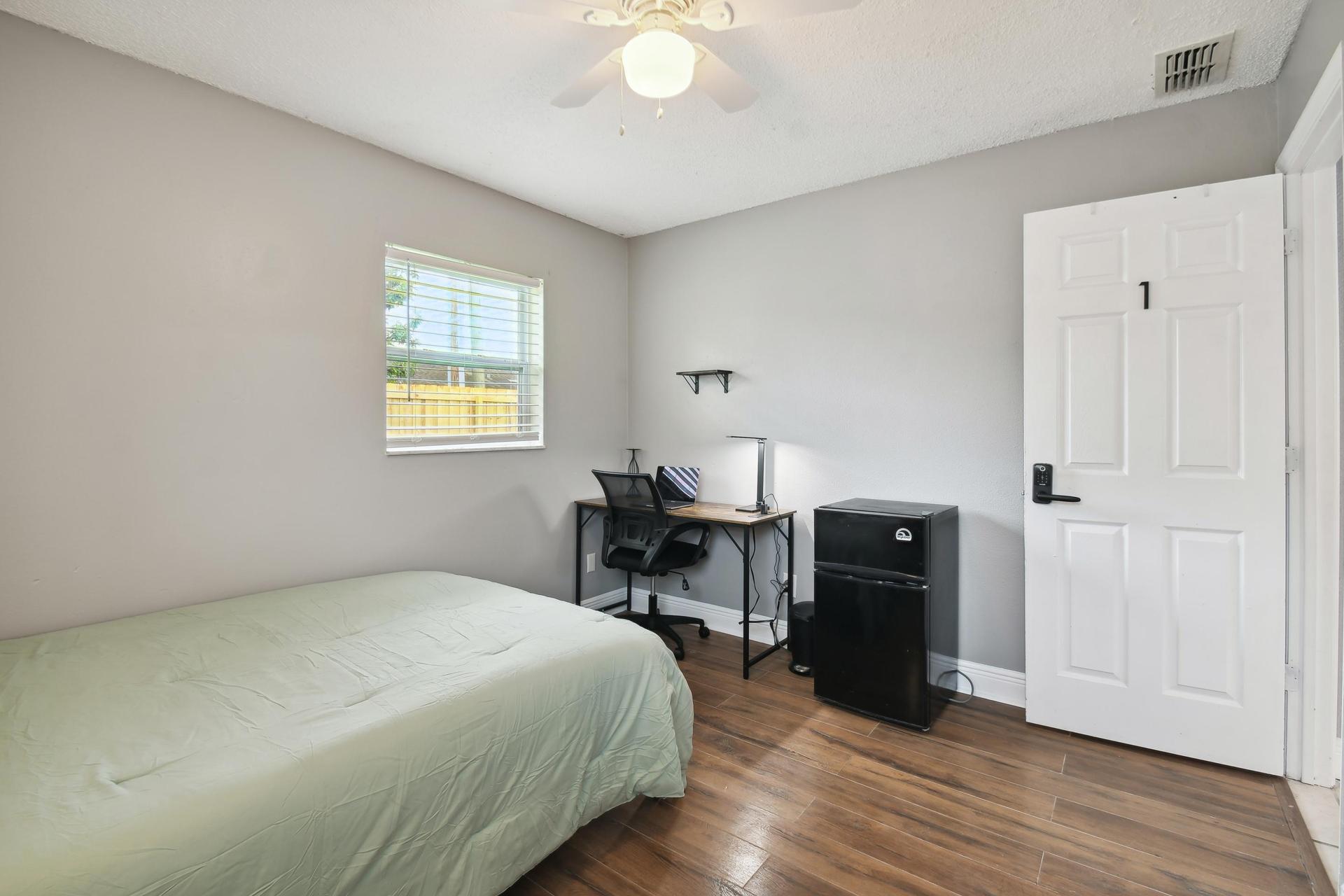 Your own mini fridge and freezer plus desk and office chair.