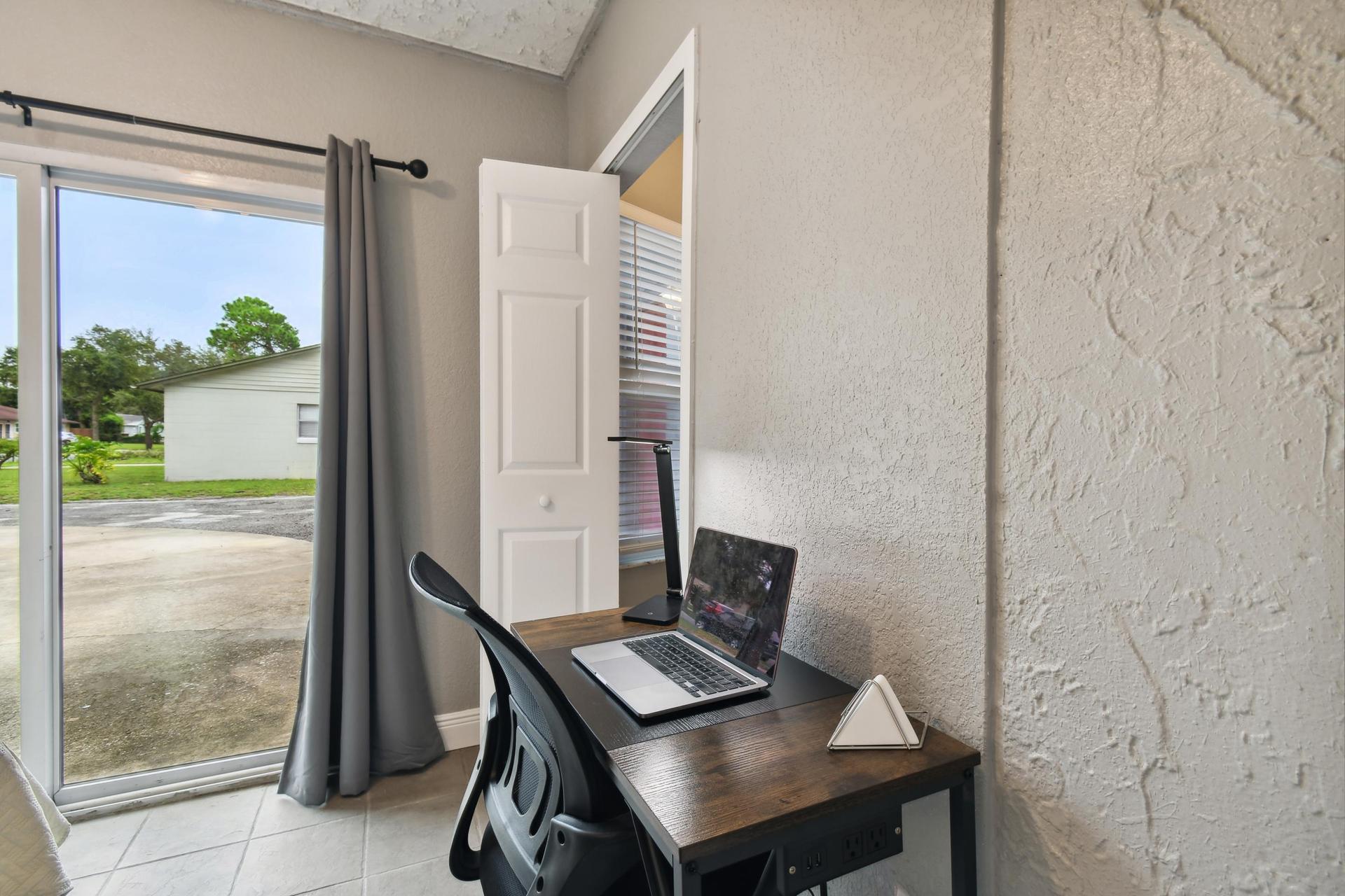 Office desk, chair and light