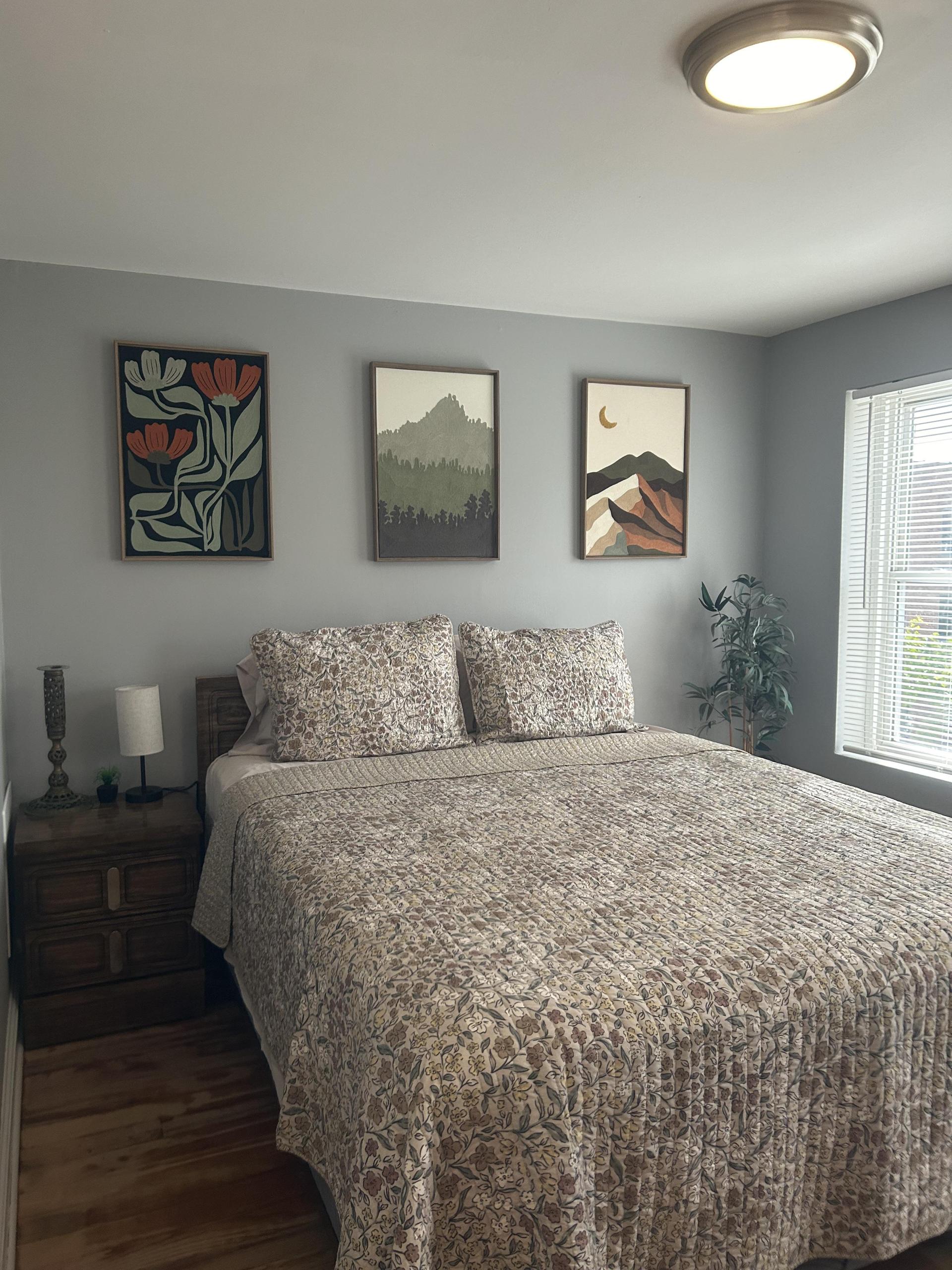 Enjoy this intimate second level bedroom with a mountainous feel.