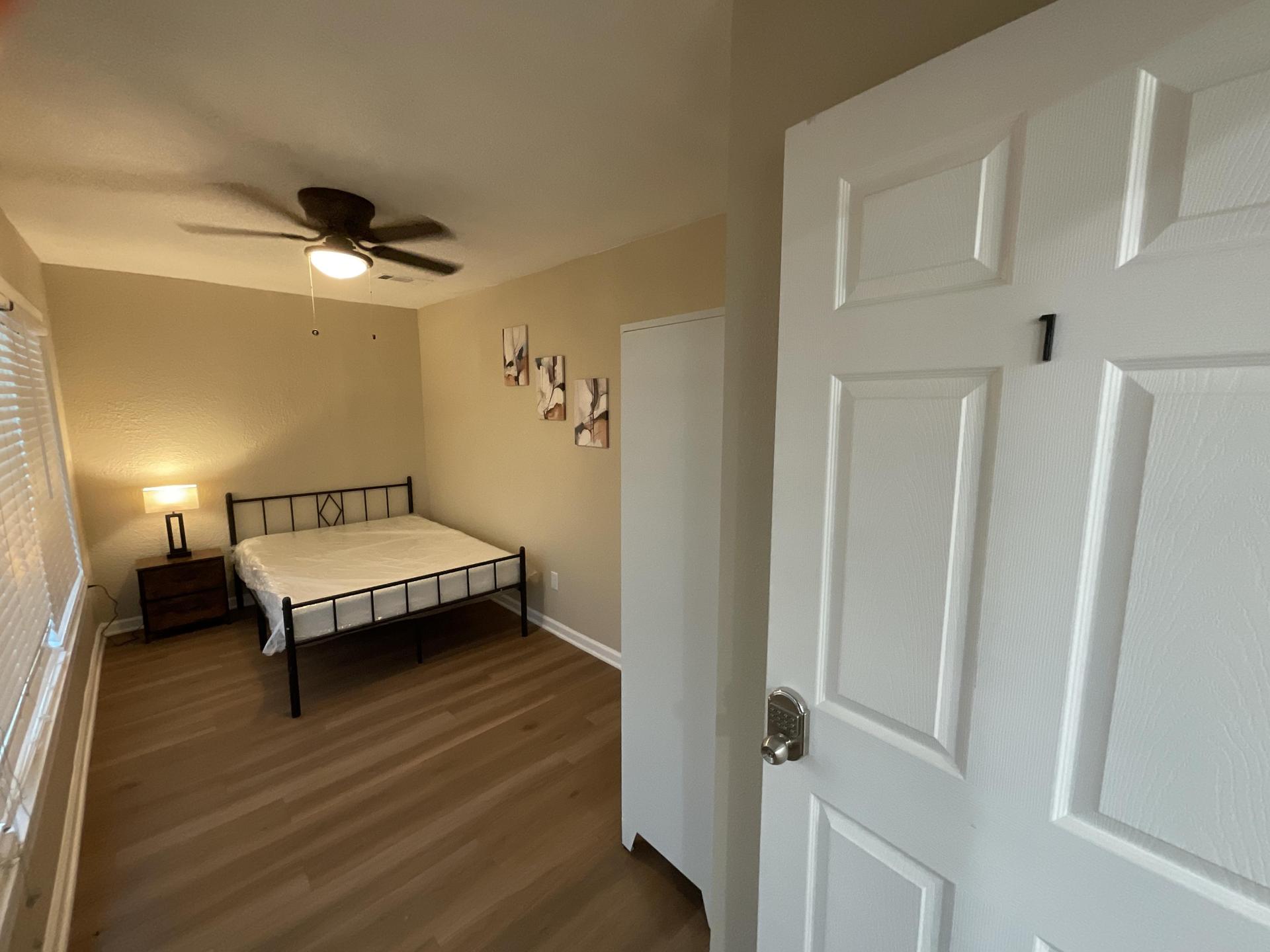 Bedroom 1. Huge window overlooking the driveway