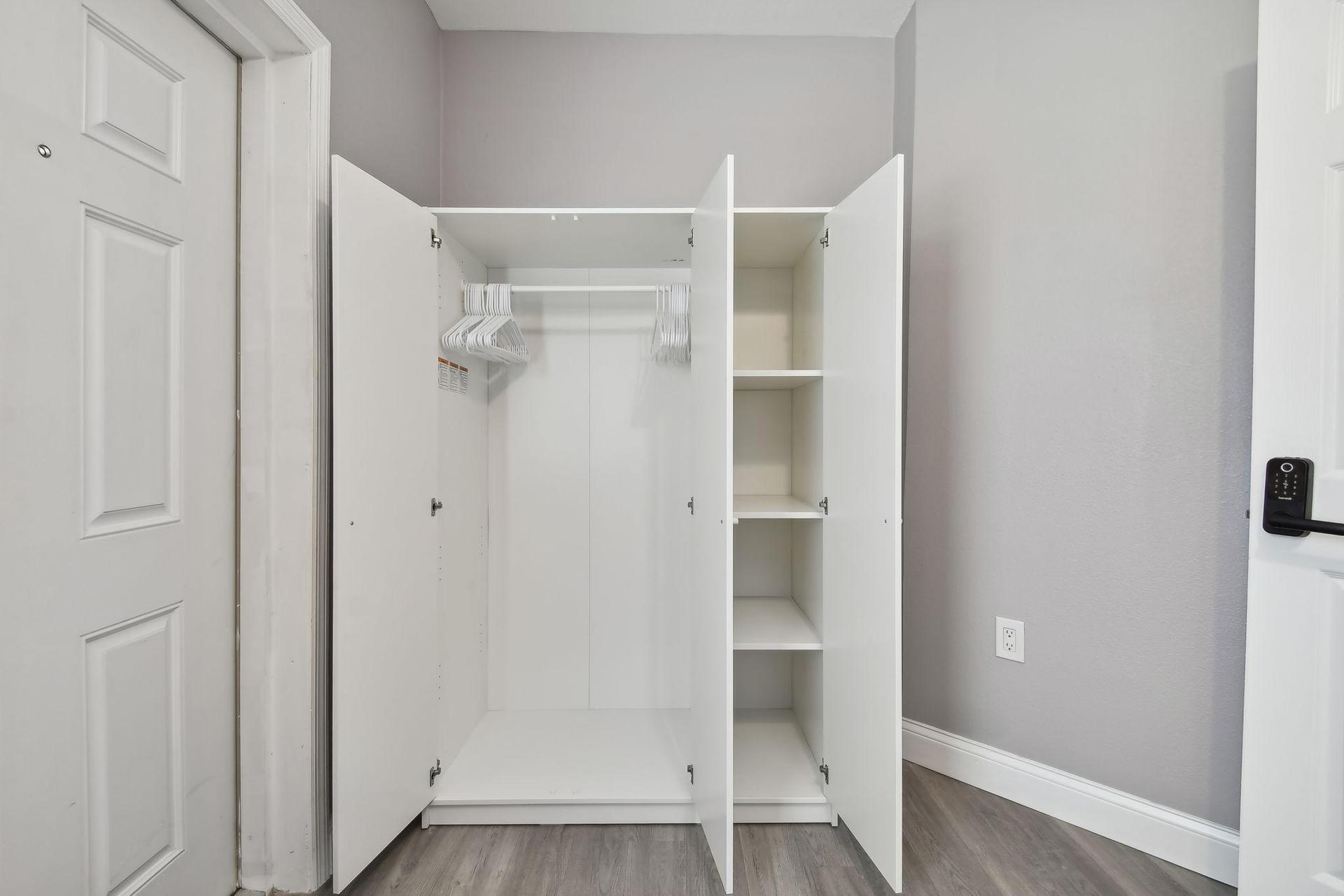 Armoire for hanging clothes and storage