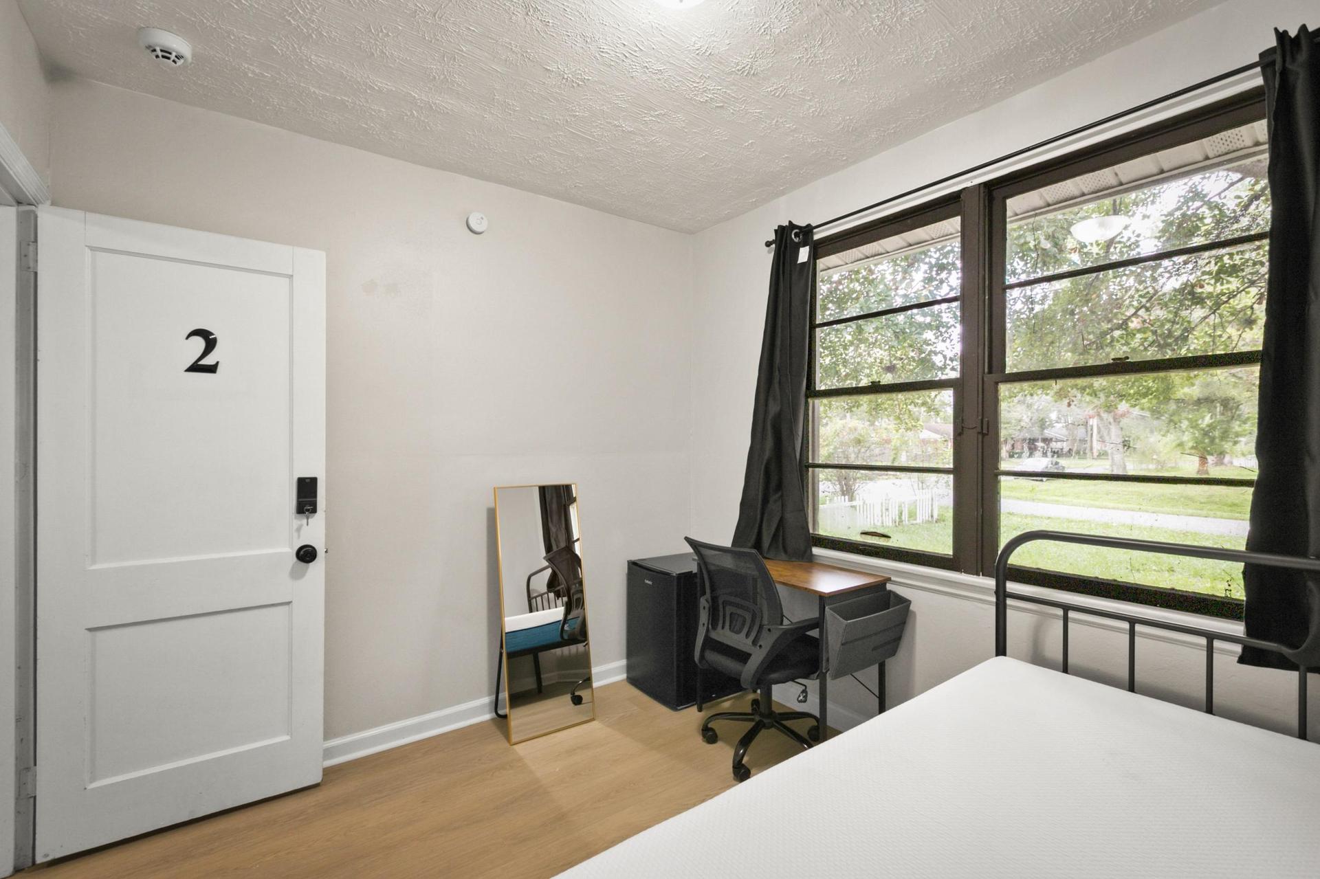 Room 2- bright and airy with a walk in closet!